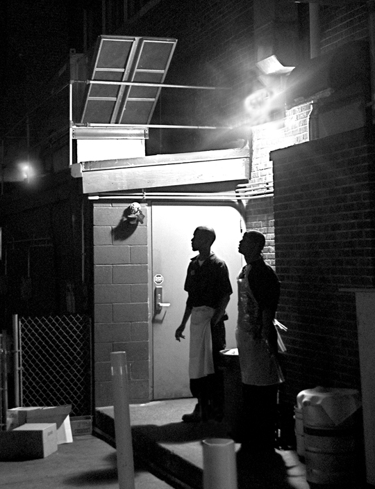 Cooks behind the restaurant Lola, Cleveland, Ohio